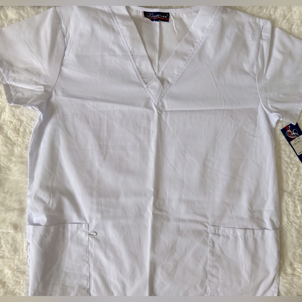 Scrub top with pockets